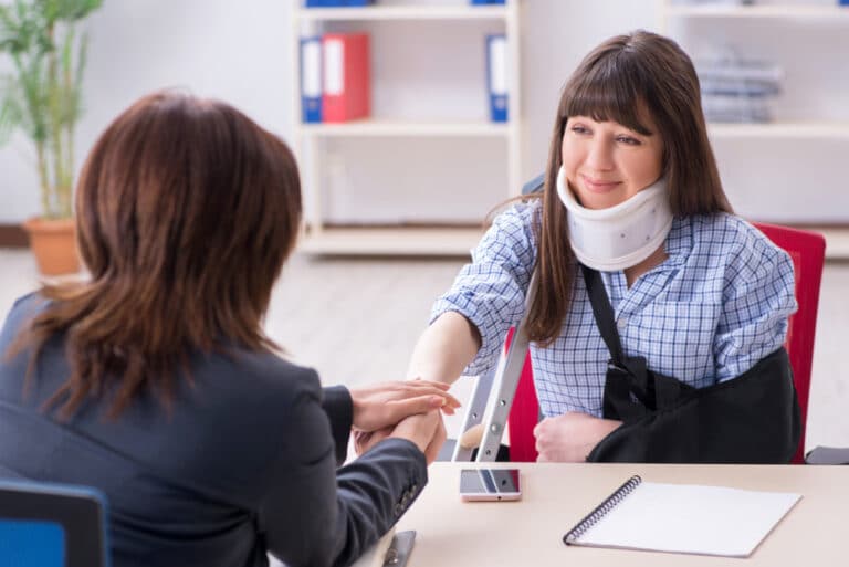 attorney and client shaking hands regarding personal injury case in Visalia