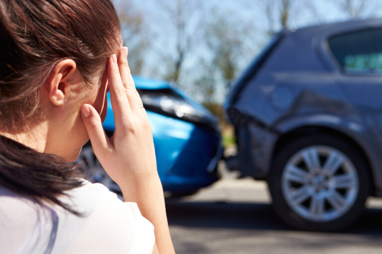 Stressed Driver Sitting needing a personal injury attorney Kerman