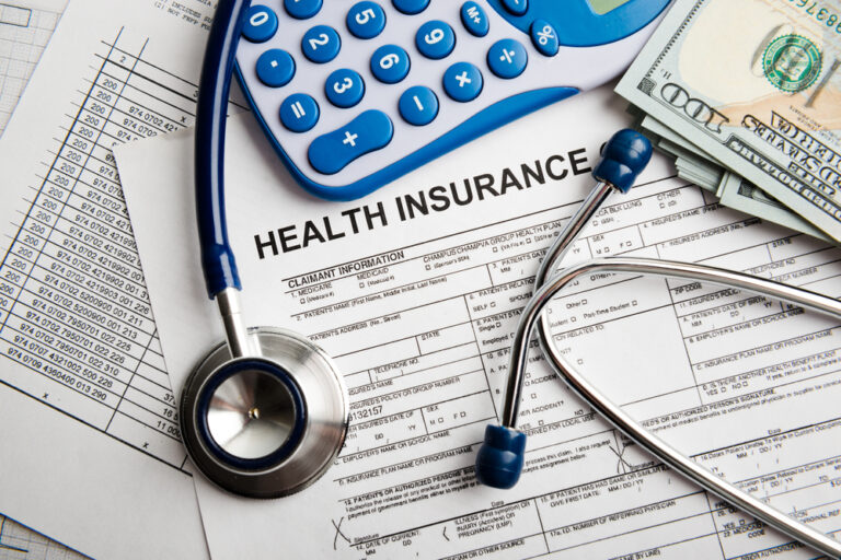 Health insurance form on desk of personal injury attorney Hanford