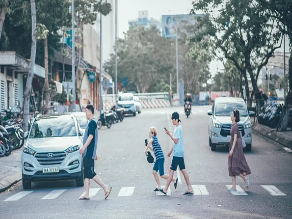 California pedestrian accident lawyer reviewing crosswalk collision evidence at Central Valley intersection accident scene